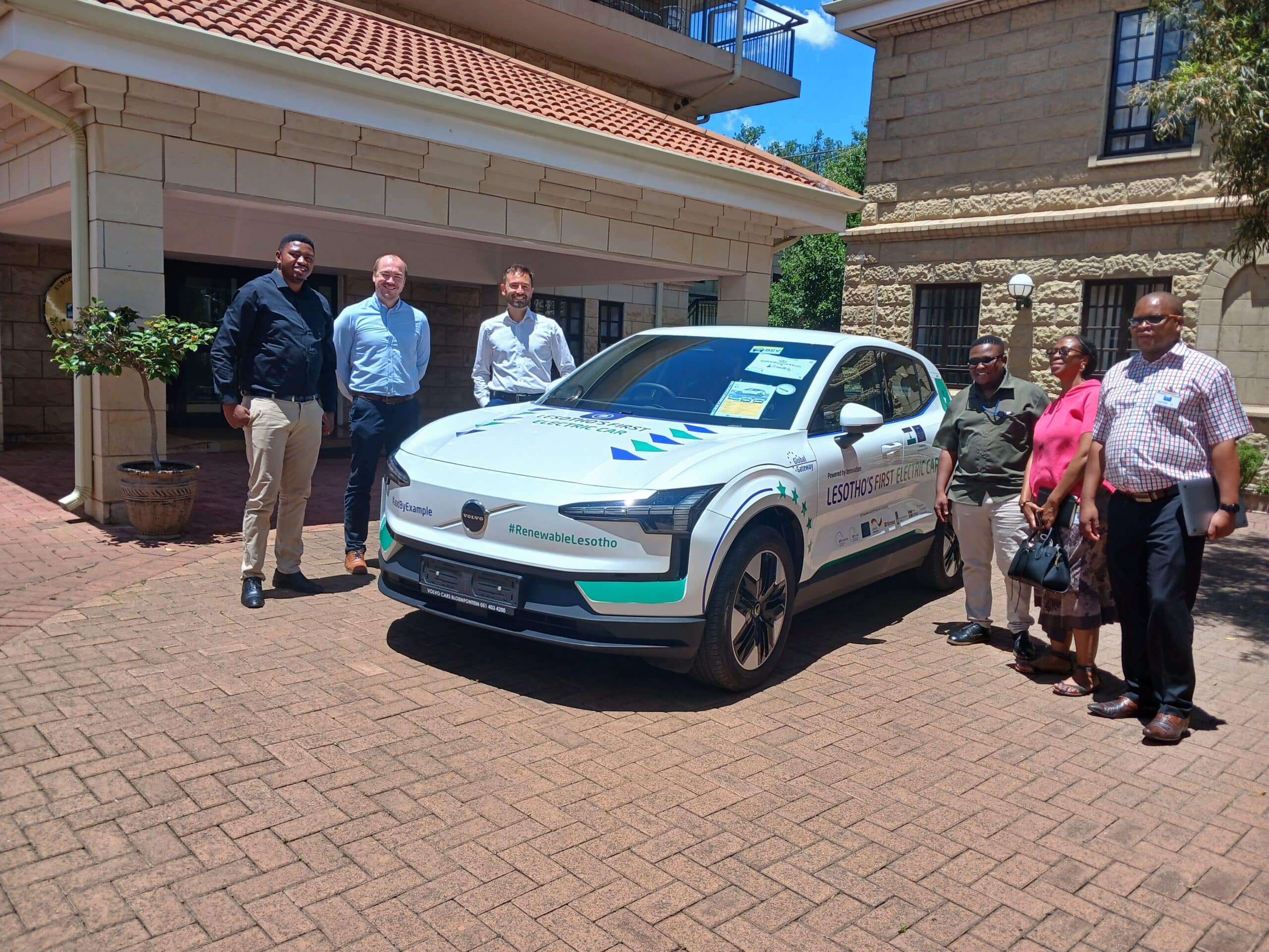 Team with the first EV in Lesotho